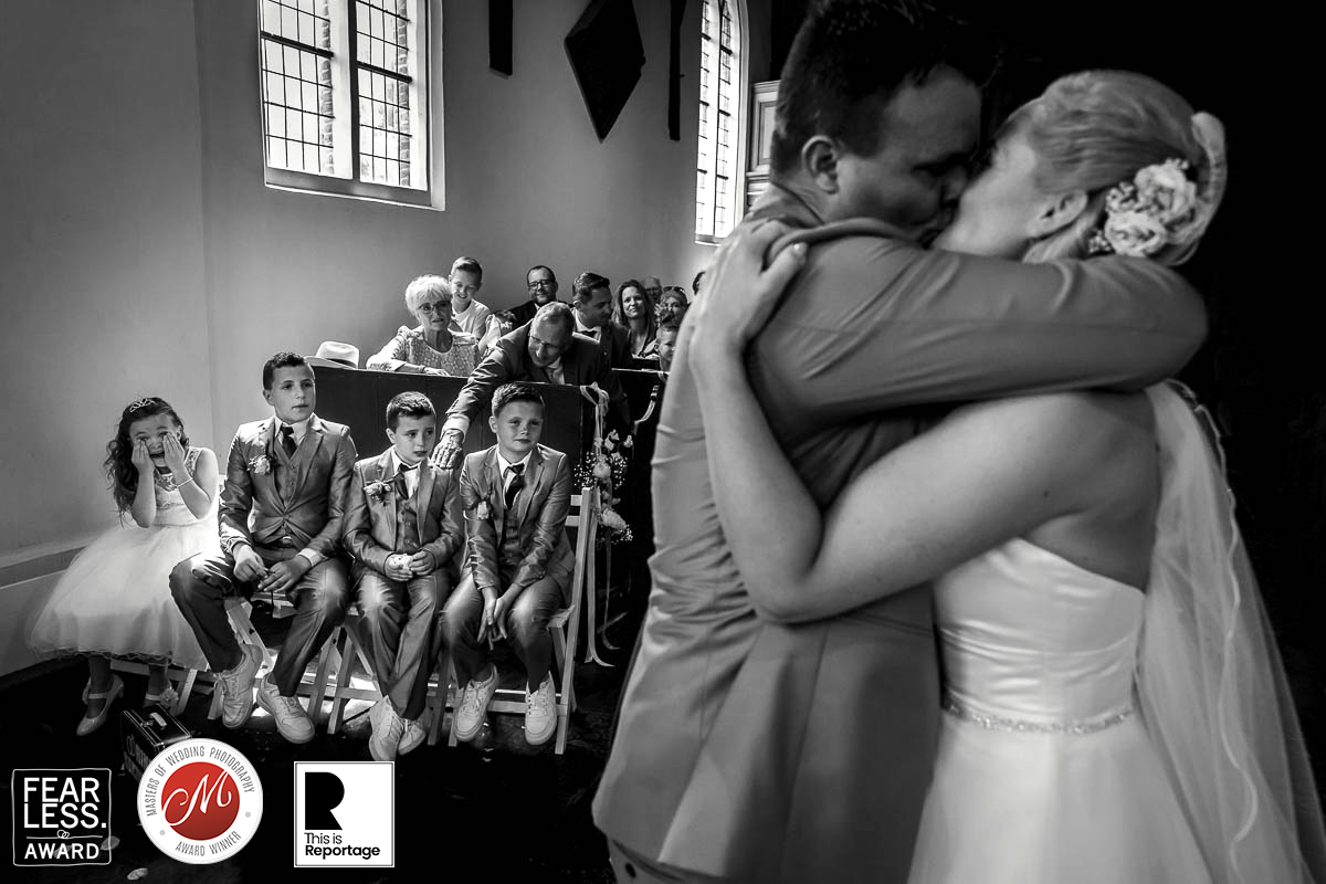 bruidsfotografie awardwinnende fotograaf bruiloft ceremonie de kus